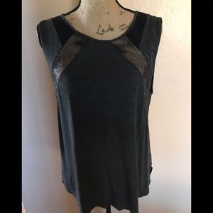 Grey sleeveless Calvin Klein top with suede accent